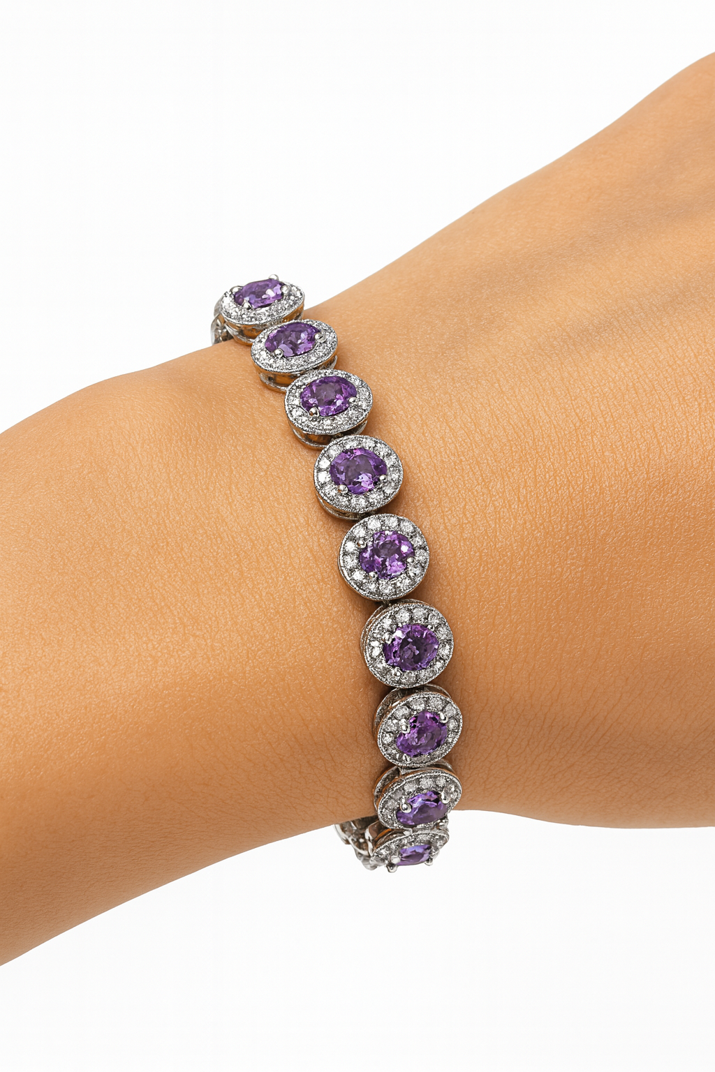 Elegant Bracelet with Amethyst Coloured Cubic Zirconia Stones and Lobster Lock. 19cm.